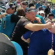 Illustration for article titled Jaguars Fan Knocks Texans Fan Out Cold With Devastating Sucker Punch